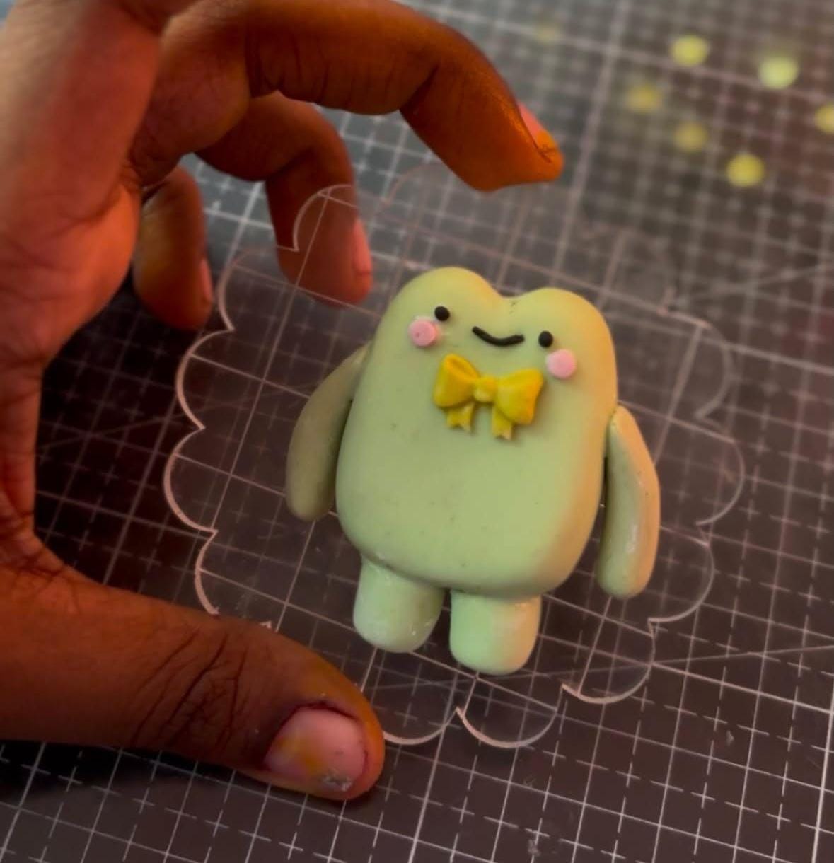 Sculpting clay figurine